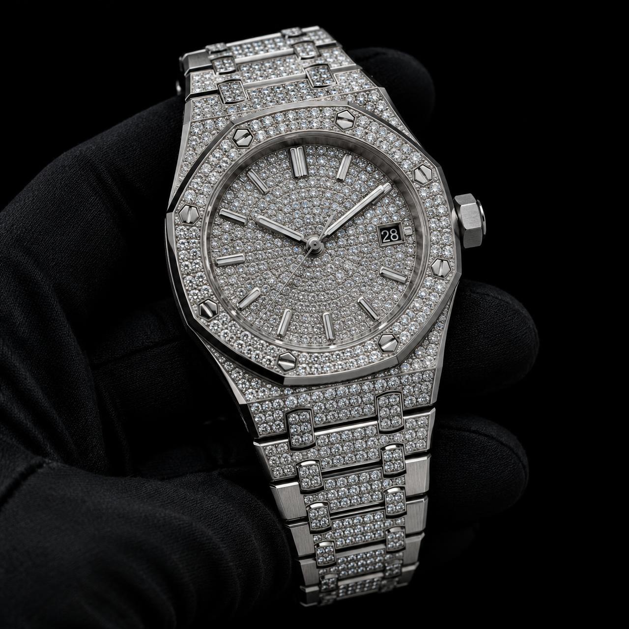 Diamond-set steel sports watch held in a black glove