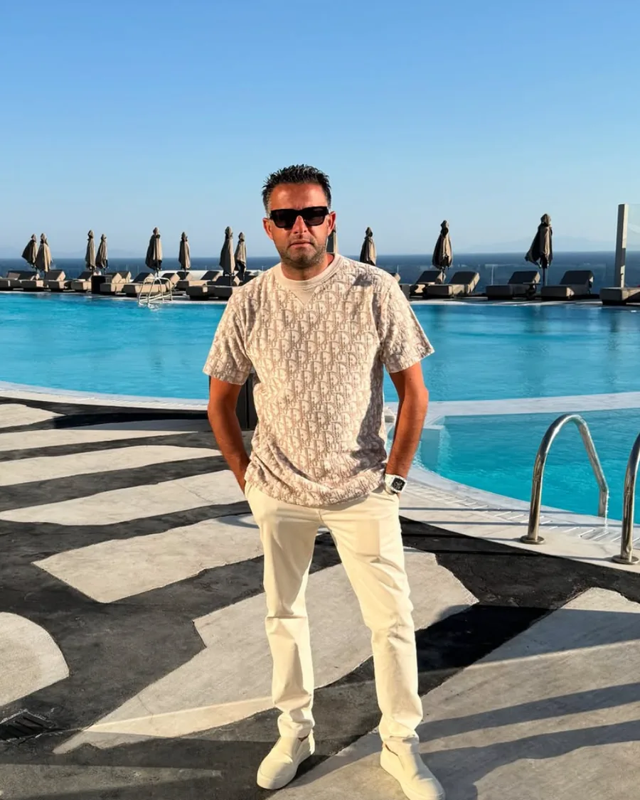 Eitan Aliav, Ace Da Jeweler, beside a pool